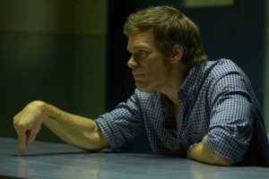 En couverture du "Hors-série", Michael C.-Hall (photo TF1), dans "Dexter". Au moins indirectement une "présence" romande, la RTS seule au monde à refuser de diffuser la remarquable et provocante "Dexter"