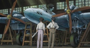 Un bombardier dans une usine allemande dans les années trente. Jiro, de dos, admiratif devant la machine, demande "Pour attaquer qui?", sans obtenir de réponse. Miyazaki est humaniste et pacifiste (Photo Frenetic)
